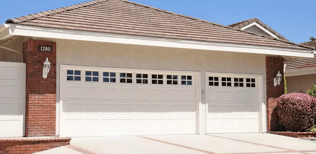 Residential garage door repair service for a double garage door in Chattanooga, TN