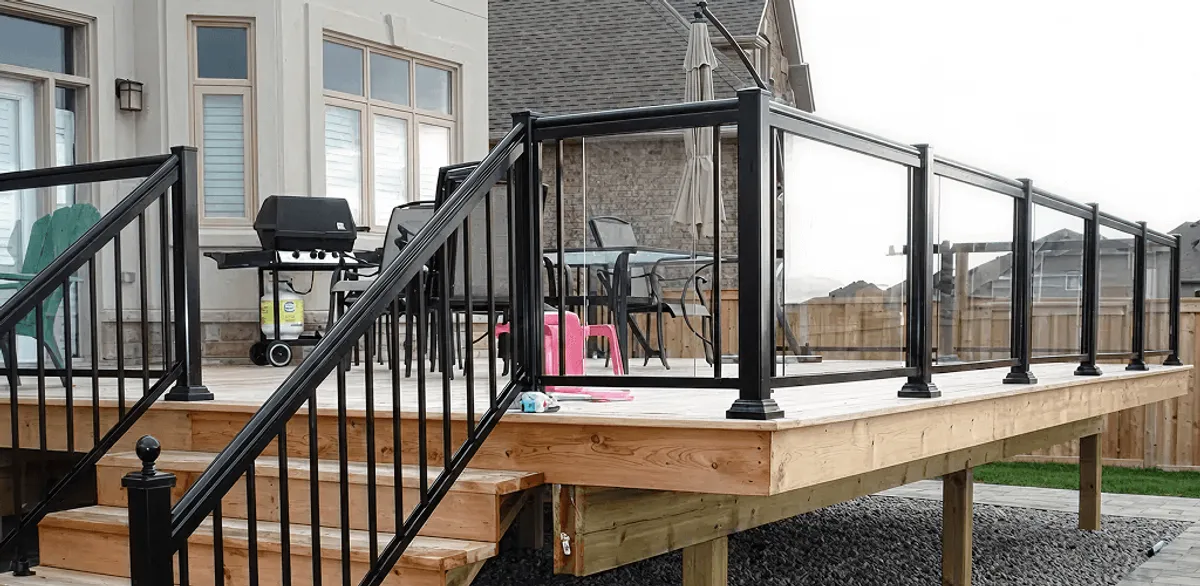 Handrail installation on a deck staircase for safety and code compliance in Chattanooga, TN