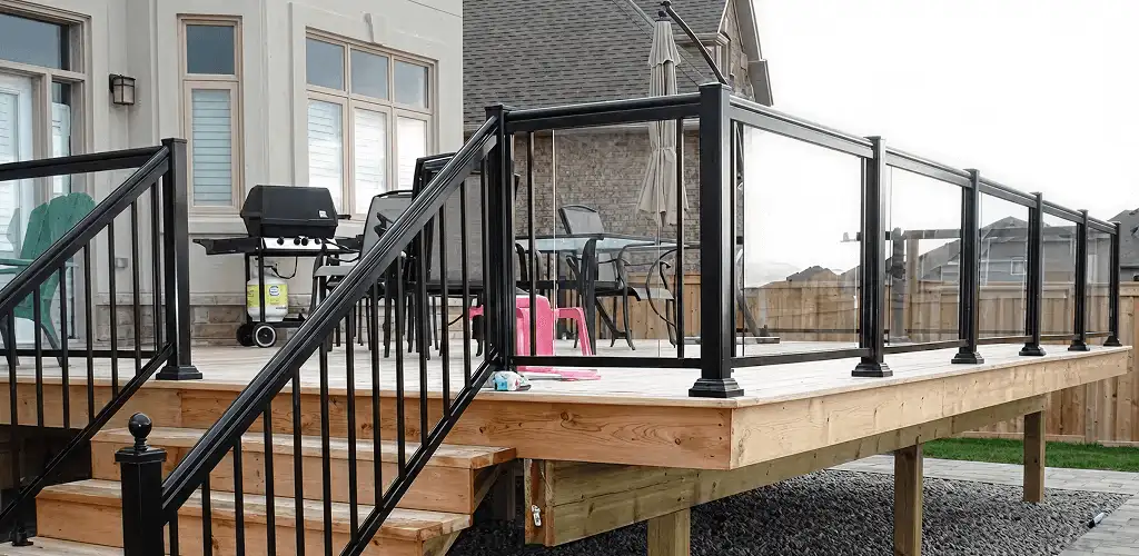 Handrail installation on a deck staircase for safety and code compliance in Chattanooga, TN
